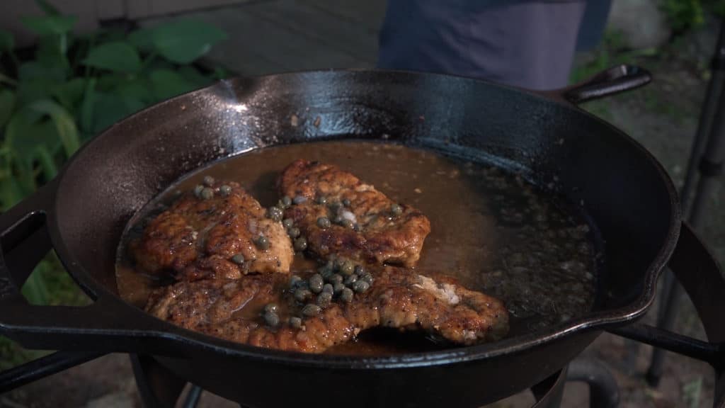 Wild Turkey Piccata in pan with sauce - Modern Carnivore